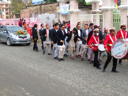 Here come's the Bride...and the Band. A Nepalese wedding dances down the street
