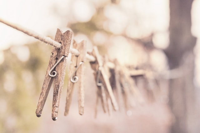 Sepia clothes pegs on a line