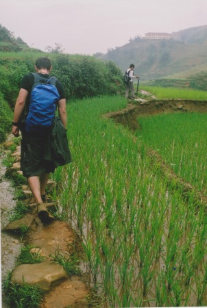 Slippery mud paths amongst rice paddies at Sapa Vietnam