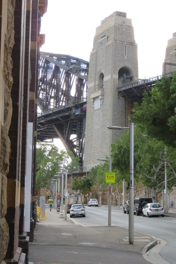 Sydney Harbour Bridge under grey skies - through the streets of Walsh Bay