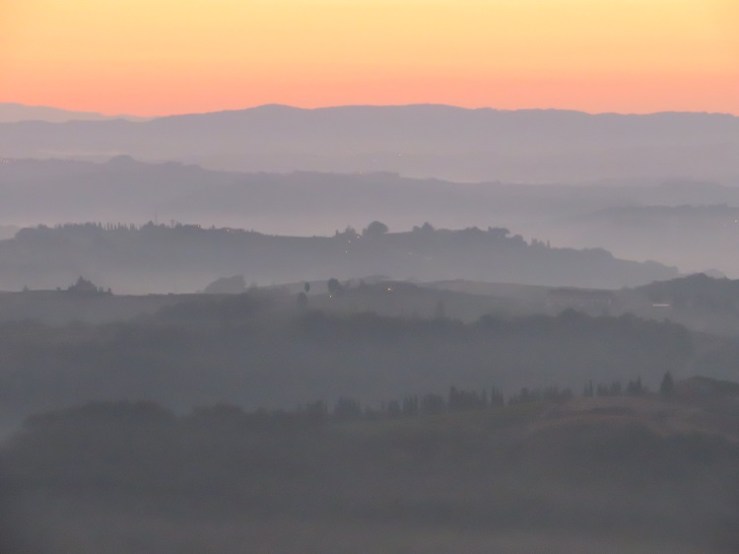 Layered colours of sunrise in Tuscany Italy