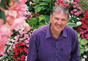 Peter Cundall among blooming flowers