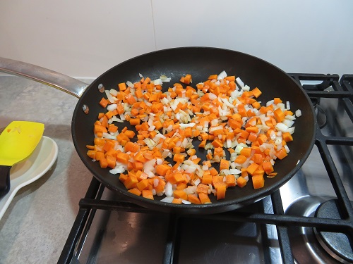 Cooking off the onion and carrot in a frypan