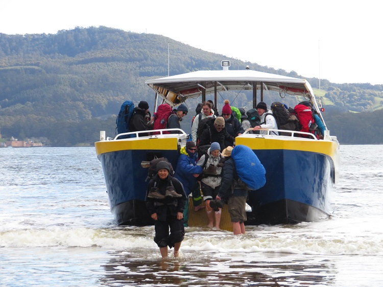 Disembarking at Denmans Cove, Three Capes Track, Tasmania