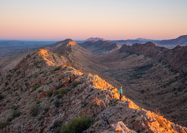A person hikes the Larapinta Trail in Central Australia