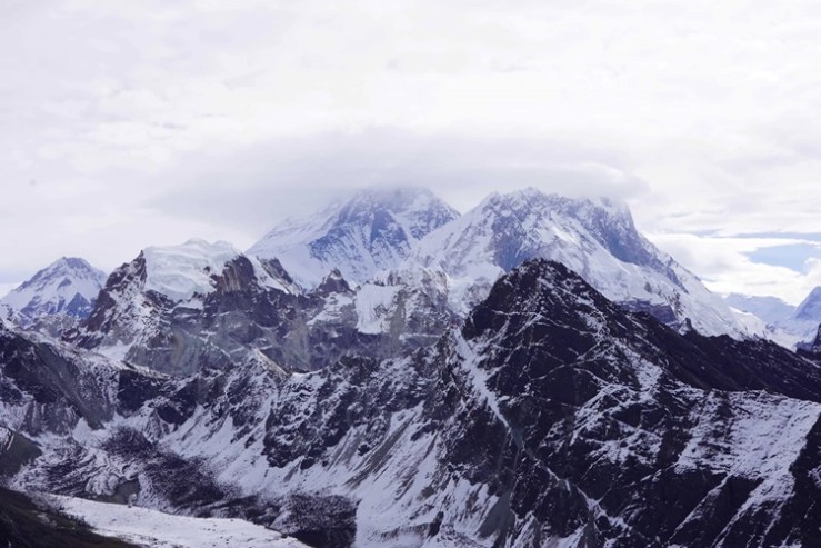 Mt Everest behind a cloud from the top of Gokyo Ri, Himalayas