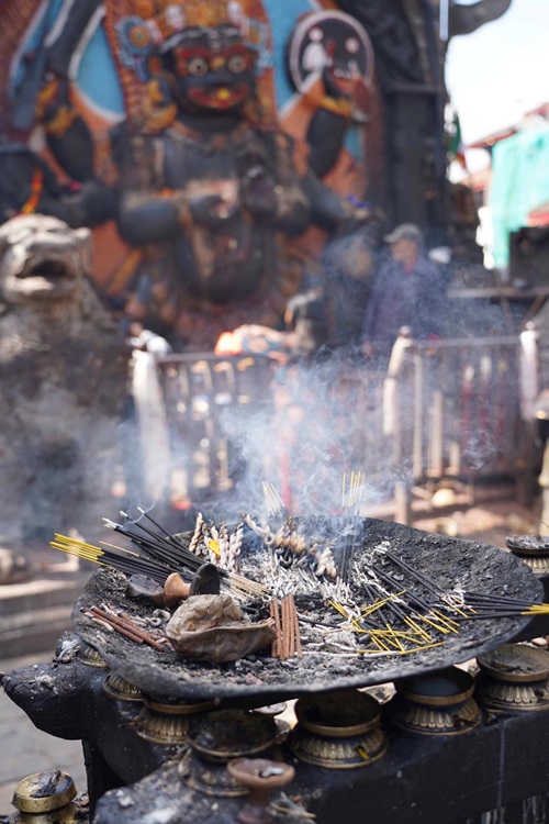 Making an offering in the Square, Kathmandu. Photo: The Husband