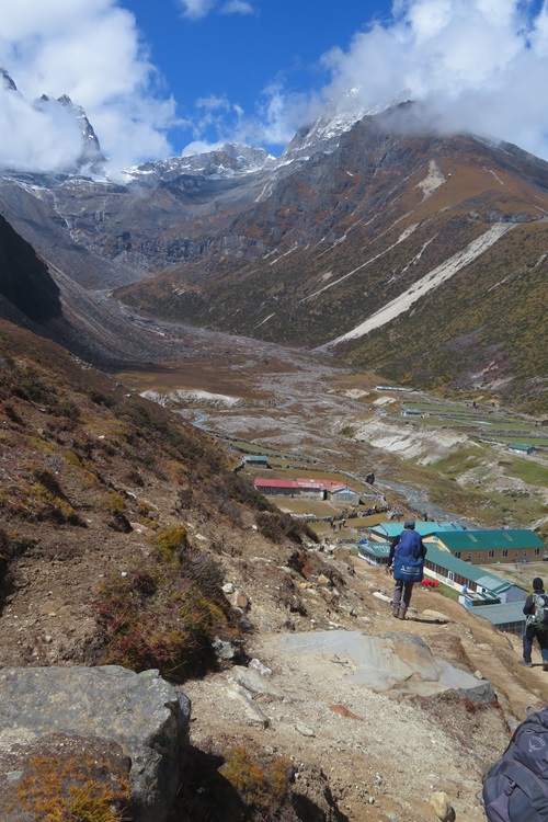 Walking down into Macchermo, Himalayas
