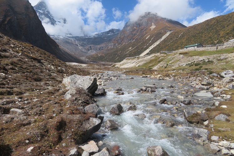 Walking down into Macchermo, Himalayas