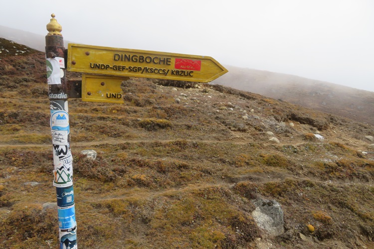A sign points the way to Dingboche, Nepal