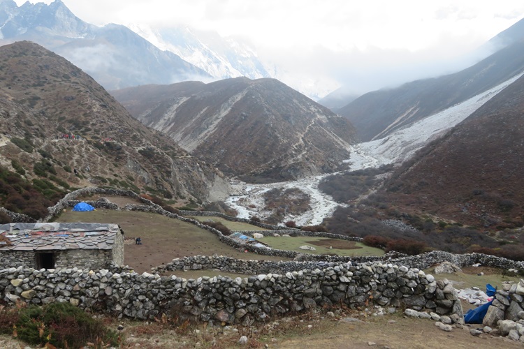 Looking down on yak paddocks on the path to Thangboche, Nepal