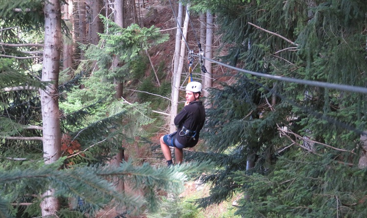 Flying through the air with Ziptrek at the top of Bob's Peak, at Queenstown, New Zealand