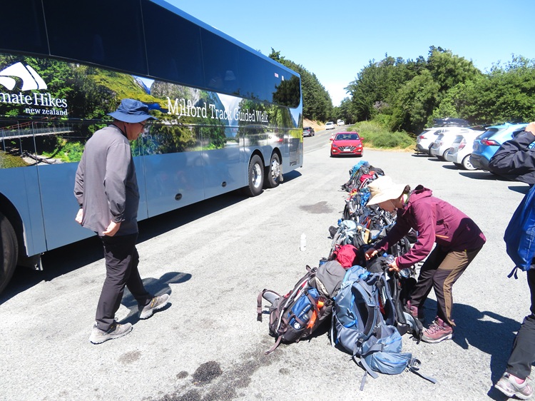 Scrambling to get our backpacks, Milford Track